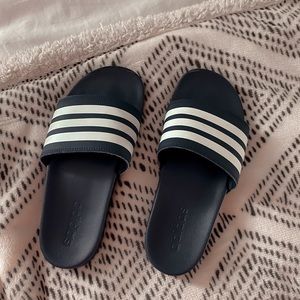 Navy blue adidas slides